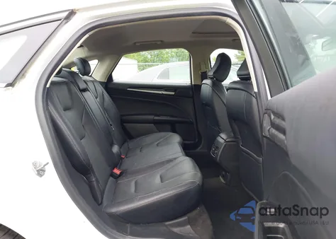 2020 Ford Fusion Hybrid Titanium z USA, uszkodzony, nr VIN 3FA6P0RUXLR139574